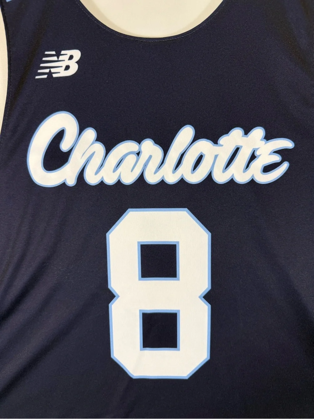 New Balance Men’s Navy Blue and White Charlotte Number Rash Guard